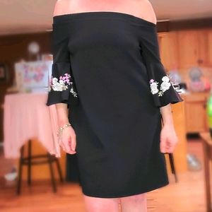 J. Lo off shoulder dress